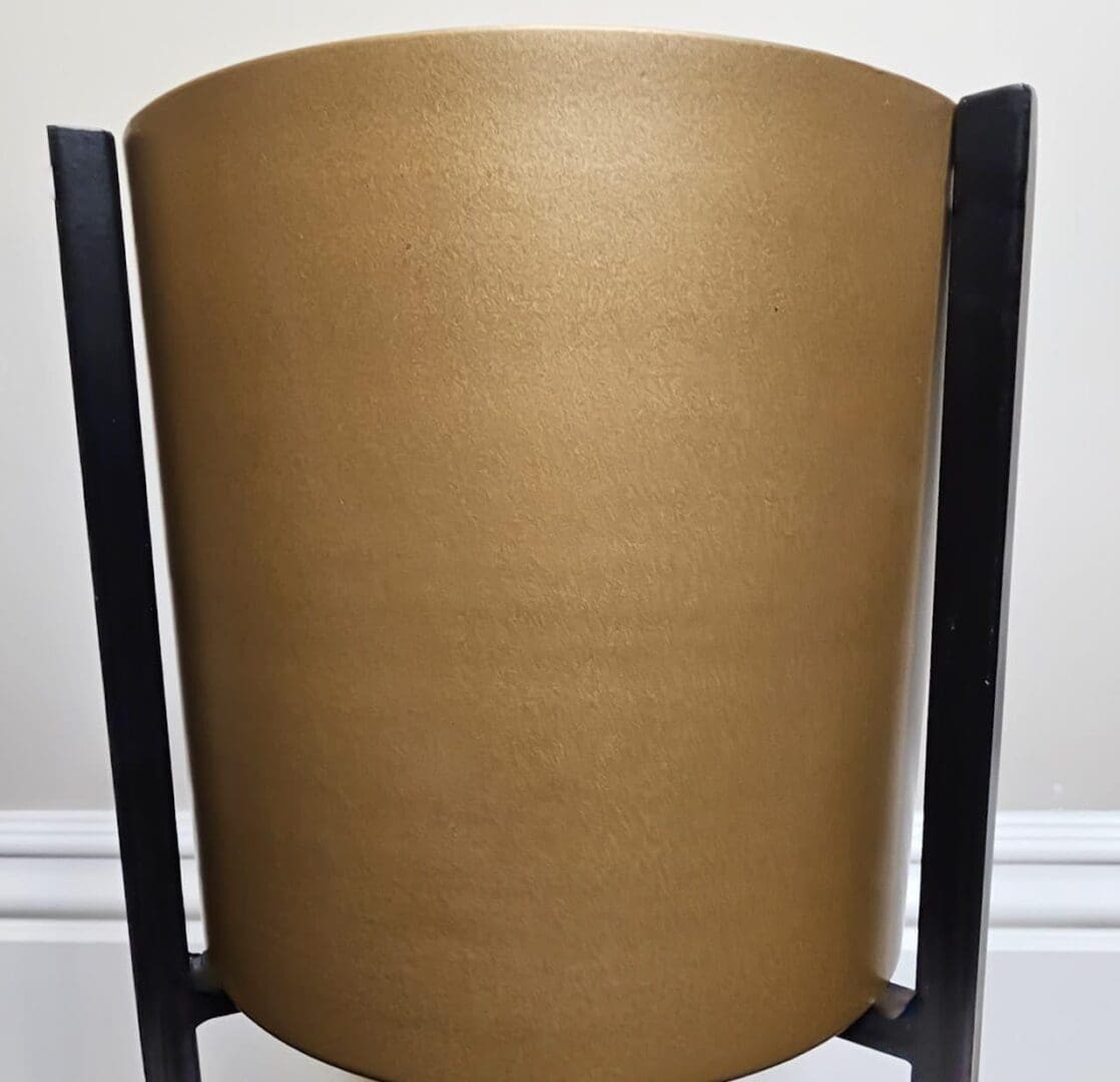 A large brown paper bag sitting on top of a wooden stand.