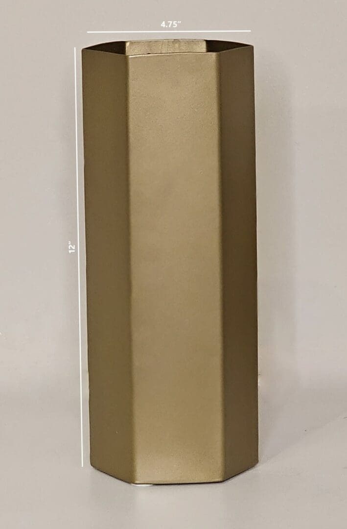 A tall mirror with gold frame and white border.